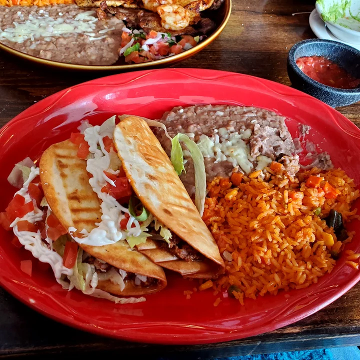 El Muchacho Alegre signature dishes Fried Taco BirriaChimichangaEl Regio